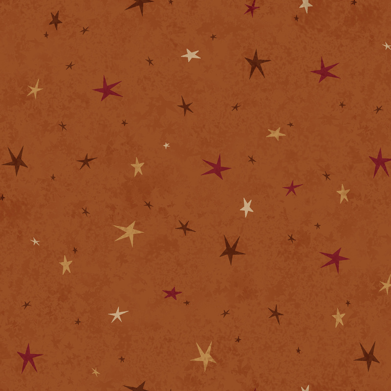 A dark orange fabric featuring a tonal star-themed design.