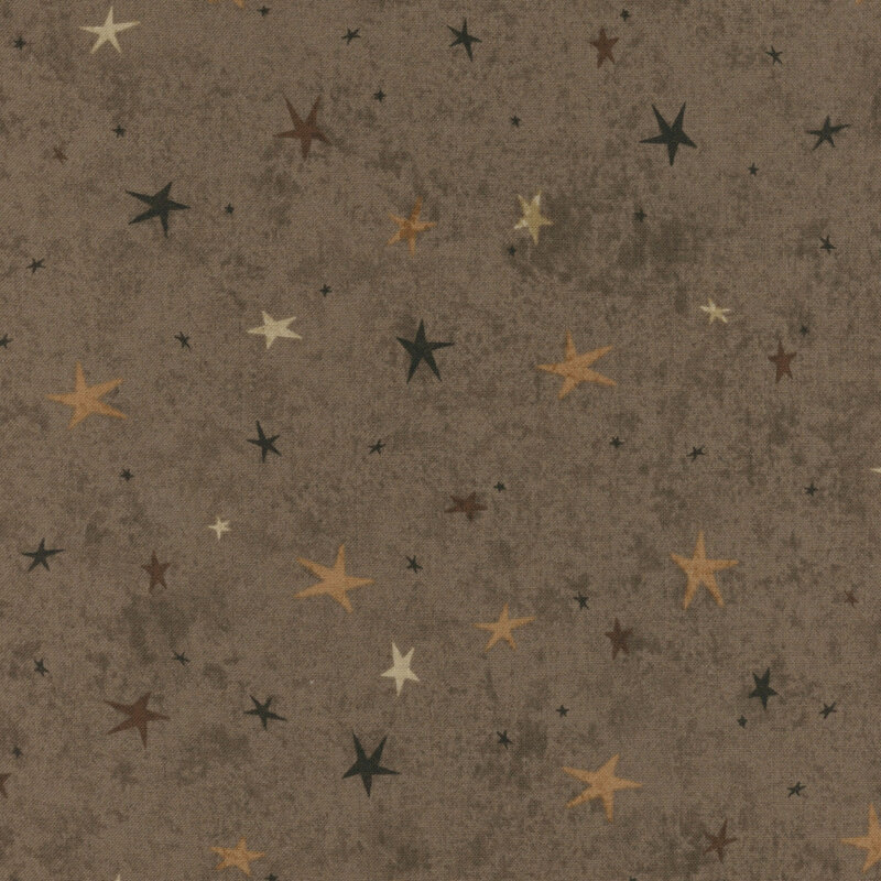 A warm gray fabric featuring a tonal star-themed design.