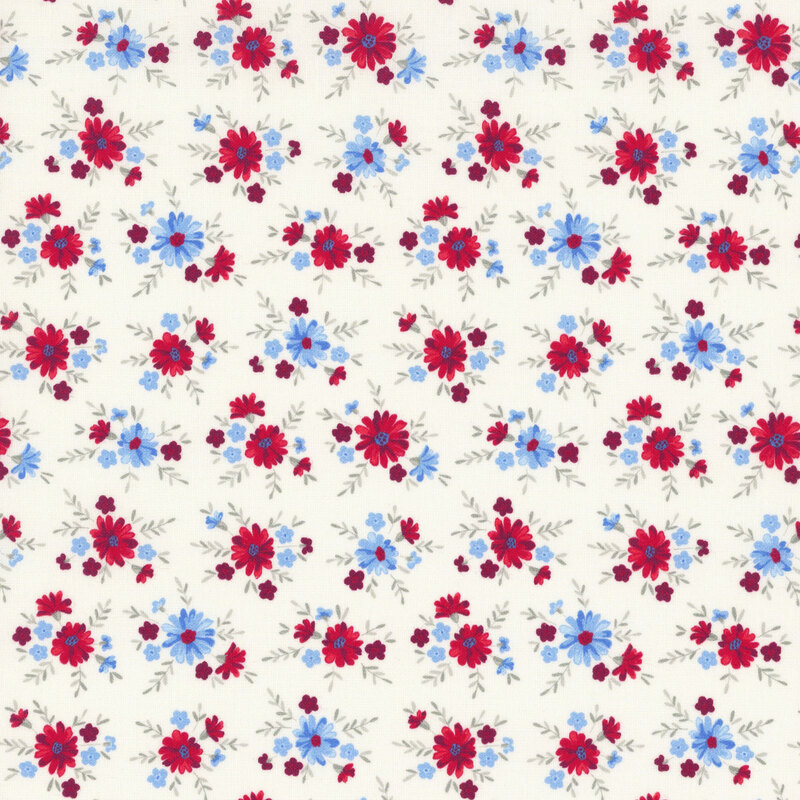 red and light blue flowers tossed on white fabric