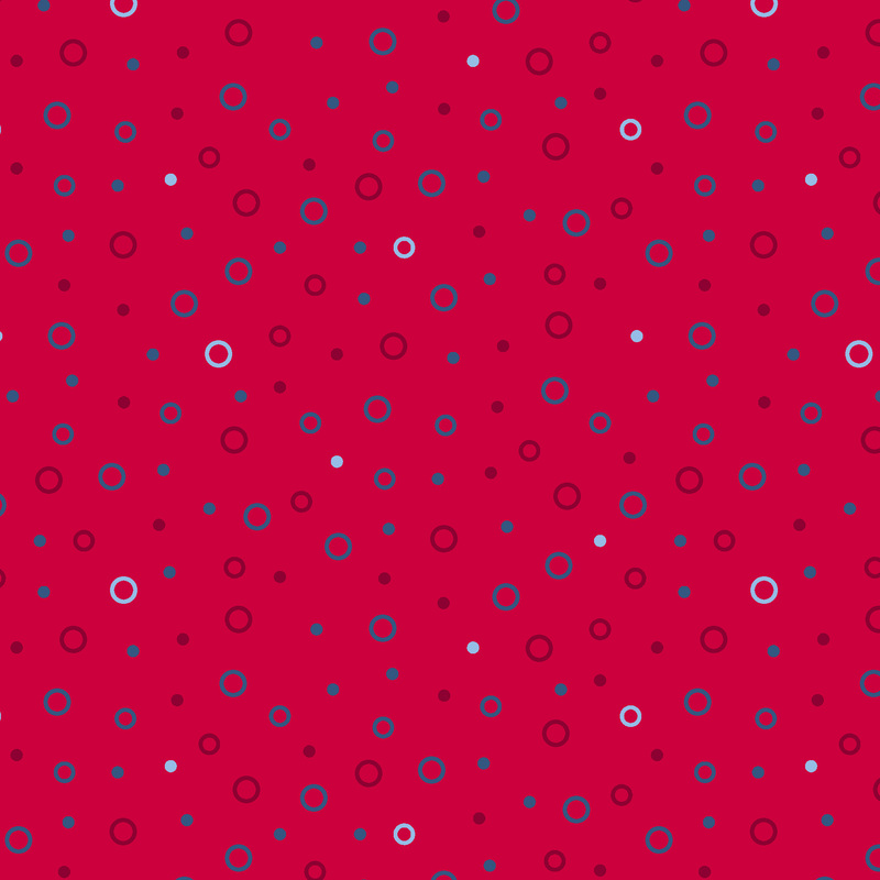 white, blue, and dark red circles tossed on bright red fabric