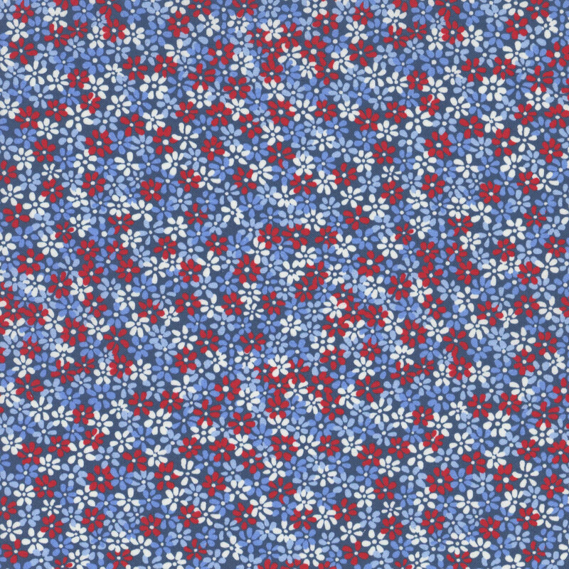 white, blue, and red flowers packed on blue fabric