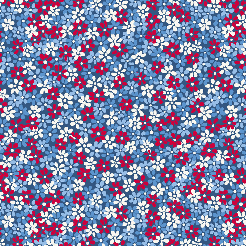 white, blue, and red flowers packed on blue fabric
