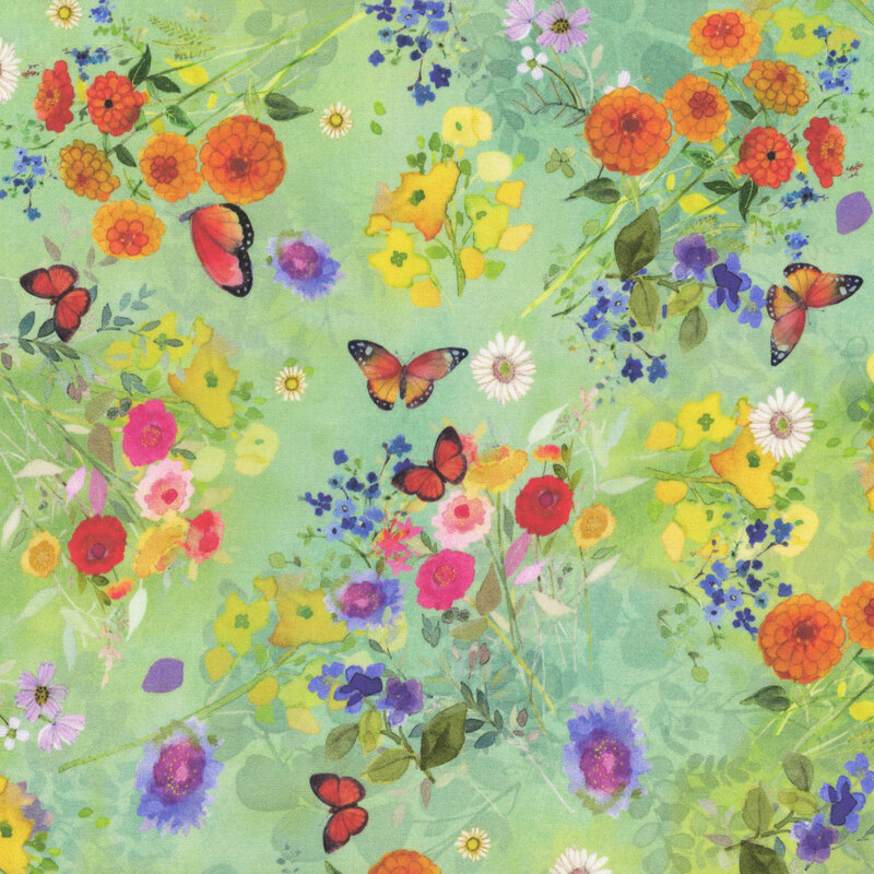 wildflowers in red, pink, orange, and yellow with long green stems tossed with monarch butterflies on mint fabric