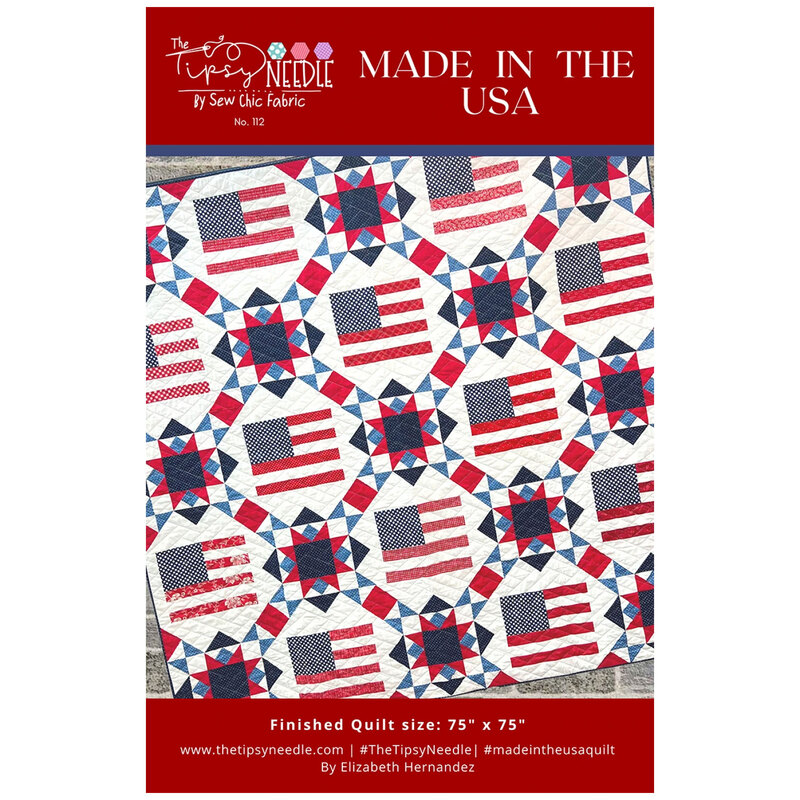 The front of the Made In The USA Quilt Pattern, showing the finished quilt held up in front of a brick wall.