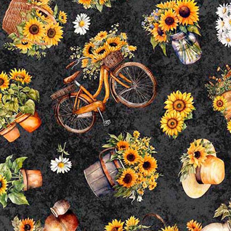 Yellow and gold sunflowers in pots, jars, bicycles, and straw hats tossed on mottled soft black fabric