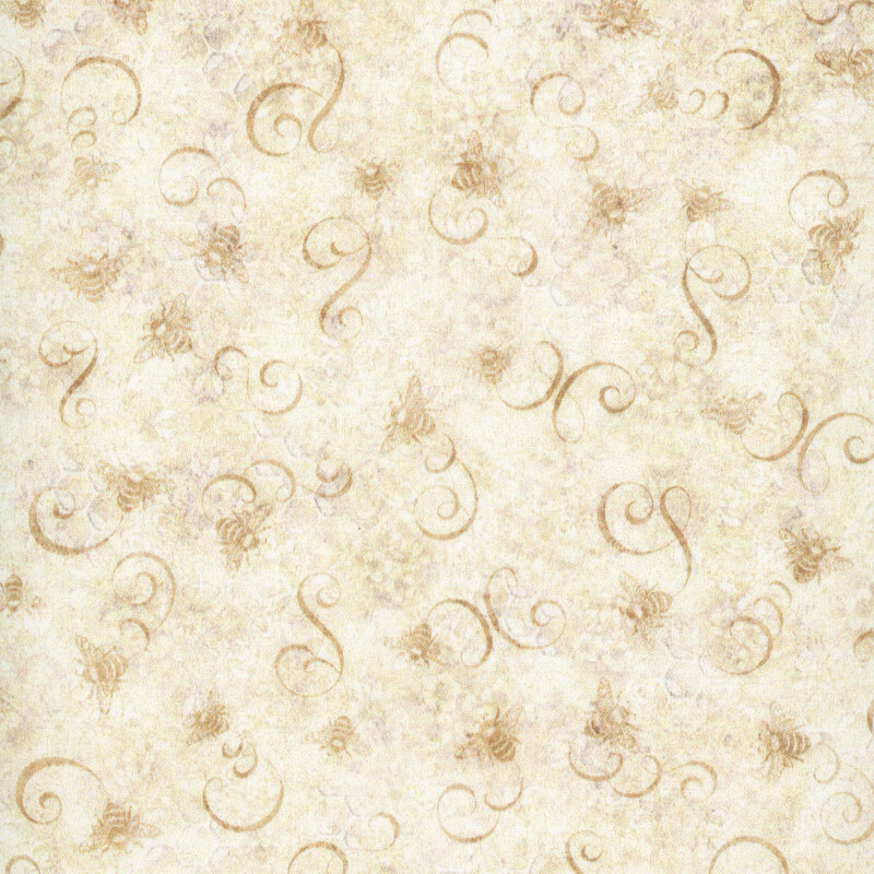 bees and swirls tossed on mottled tonal cream fabric