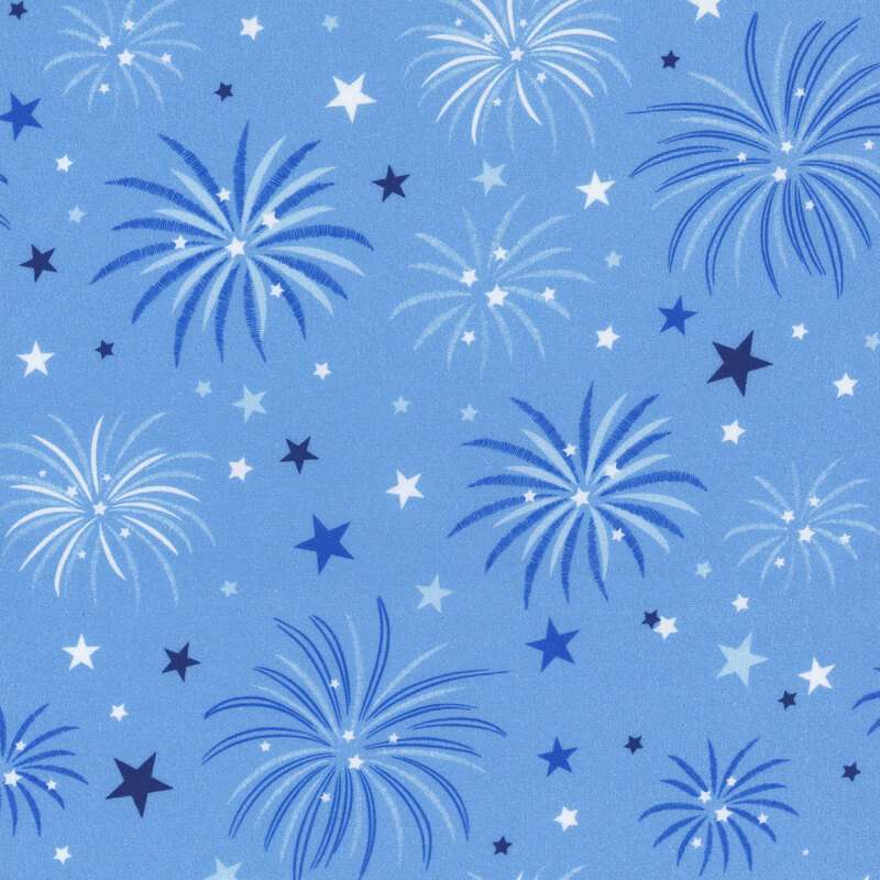 Patterned blue fabric featuring various shades of fireworks and stars.