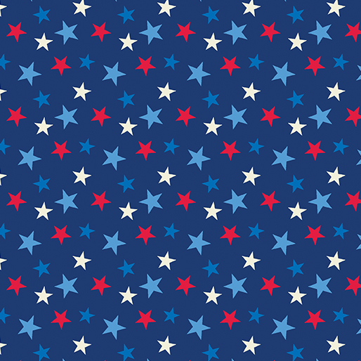 A blue fabric filled with red, white, and light blue stars in a random pattern.