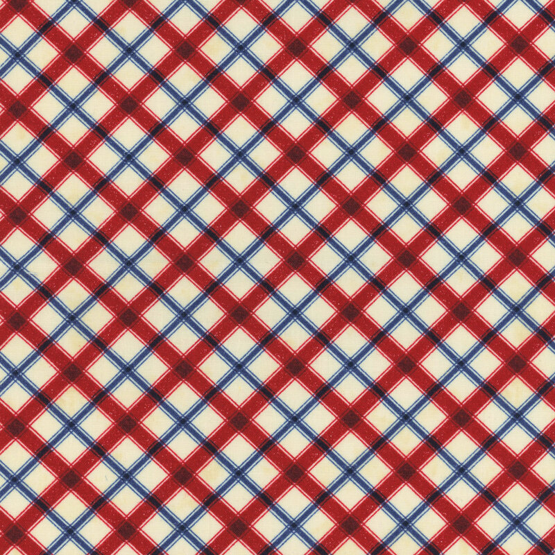 Red and blue window pane plaid on mottled cream fabric.