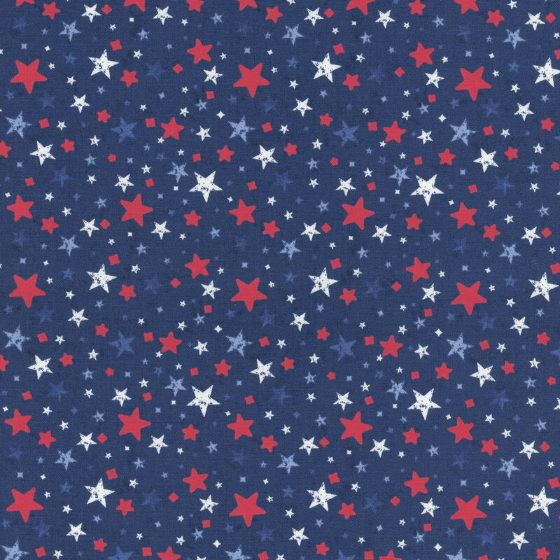 Red, white, and blue stars tossed on mottled navy blue fabric.
