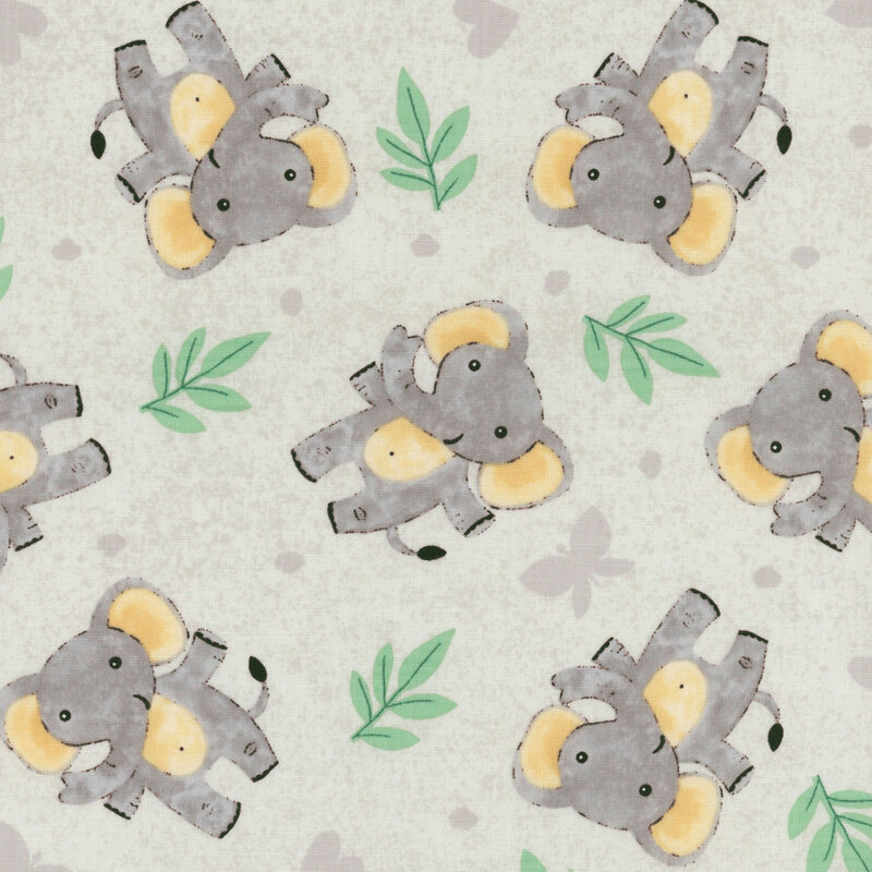gray fabric tossed with gray elephants, green leaves, and light gray hearts, butterflies, and paw prints.