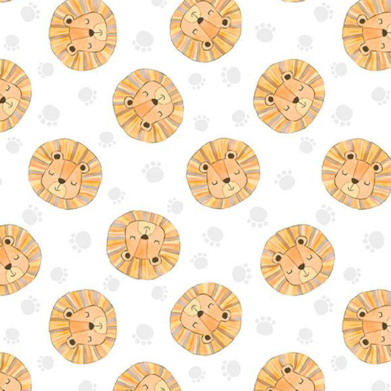 Lion heads in yellow, orange, and gold tossed with silver paw prints on white fabric
