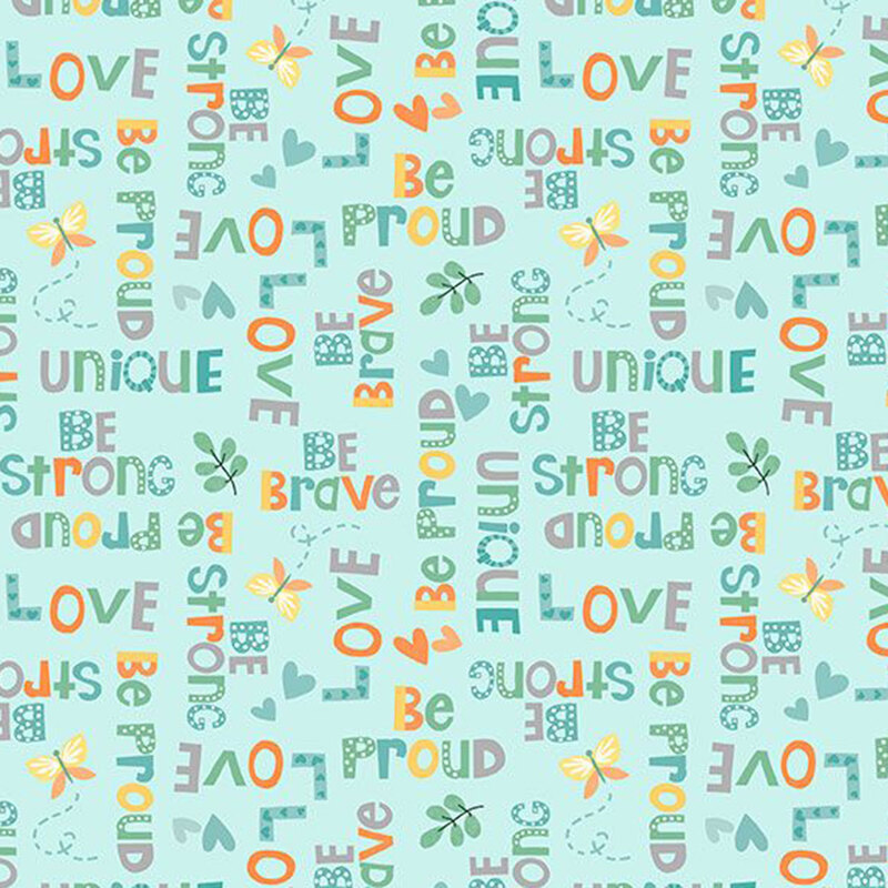 inspirational words and empowering phrases in green, gray, and orange on teal fabric