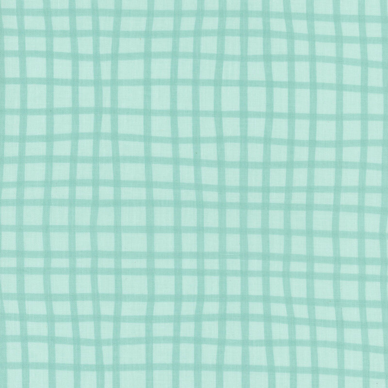 Tonal gingham pattern on teal fabric