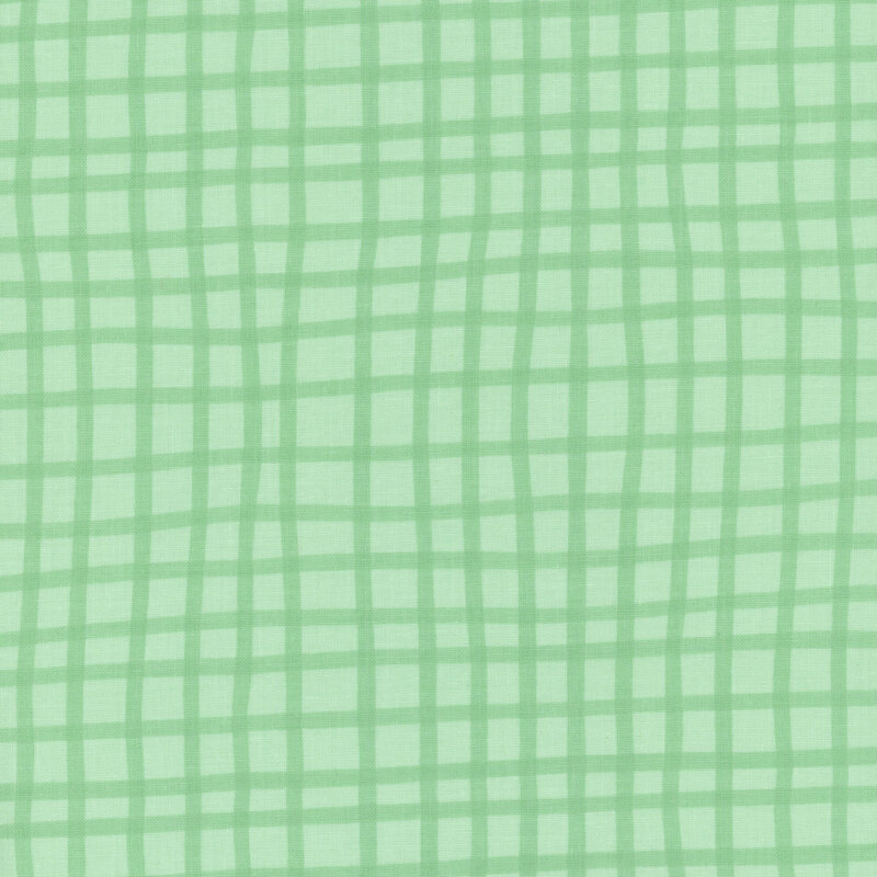 Tonal gingham pattern on sea green fabric