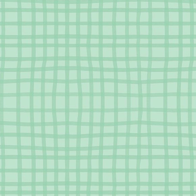 Tonal gingham pattern on sea green fabric