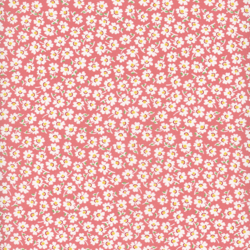 Ditsy pattern of white daisies on salmon pink fabric