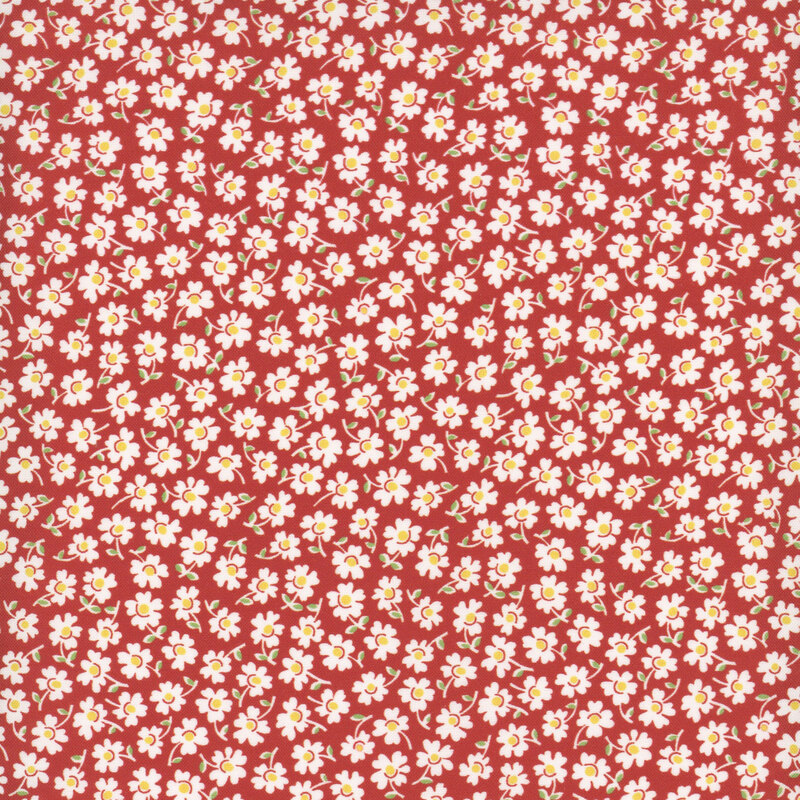 Ditsy pattern of white daisies on bright red fabric