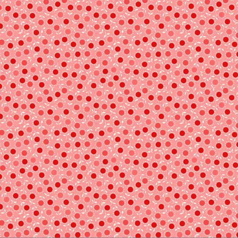 Red, salmon, and coral centers outlined with minuscule white petals and stems on pink fabric.
