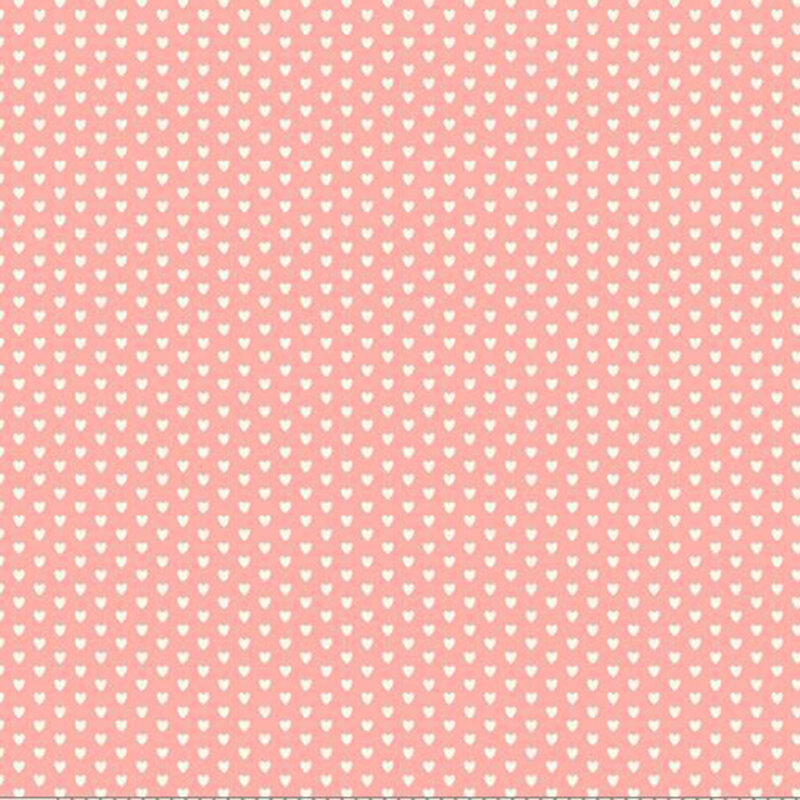 white hearts in rows on pale rose fabric