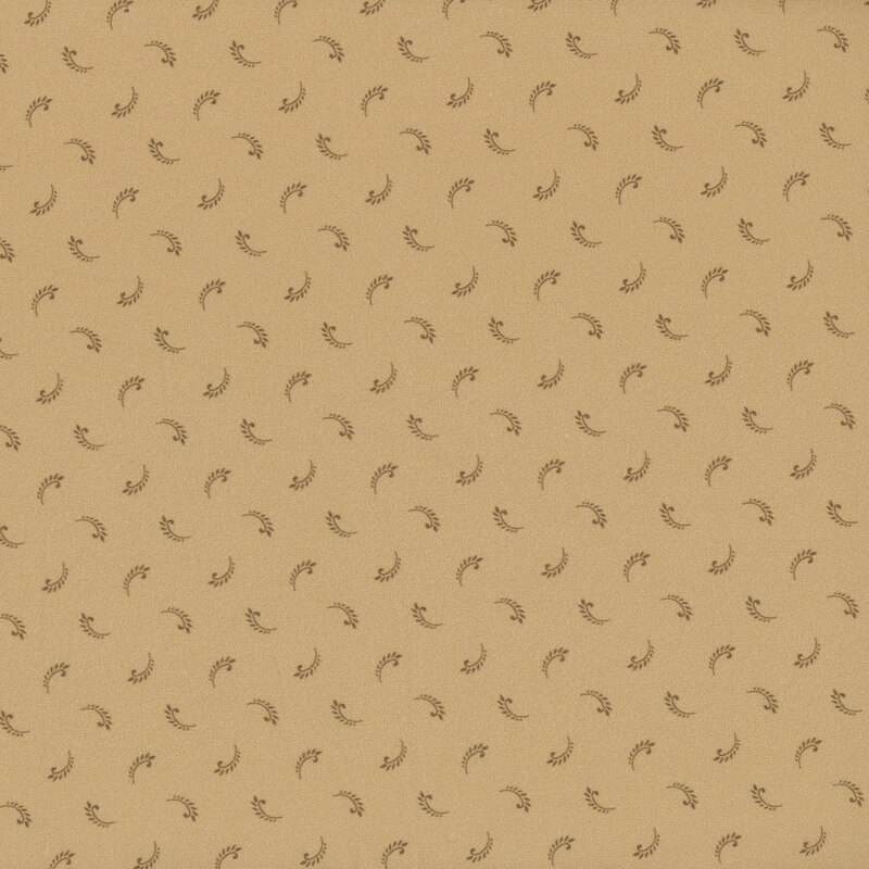 Tan fabric tossed with a tossed pattern of brown fern leaves.