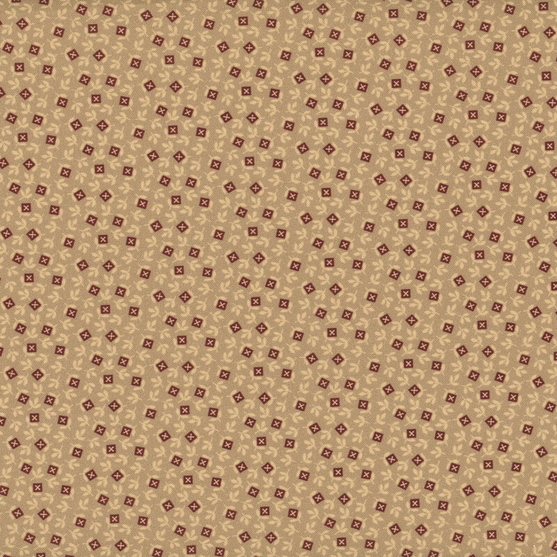 Brick red checkbox flower head design with beige leaves on tan fabric.