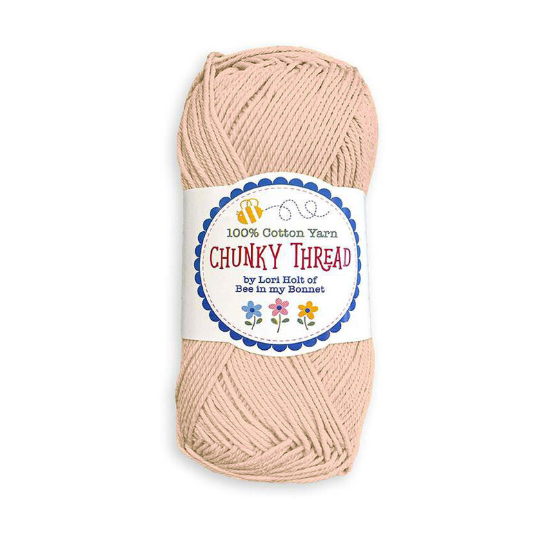 A skein of the Old Lace Chunky Thread, isolated on a white background.