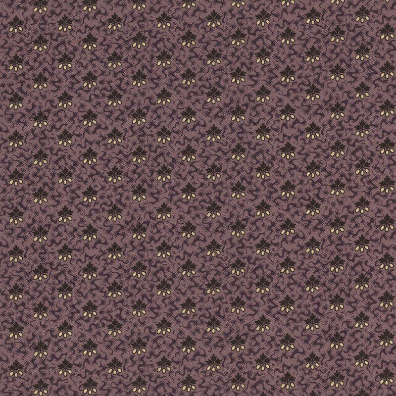 Decorative fabric pattern in shades of purple with intricate floral motifs in cream and black.