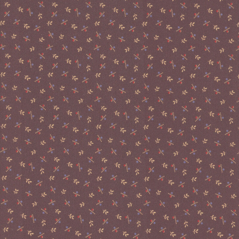 A dark mauve fabric with small leaves and calico elements.