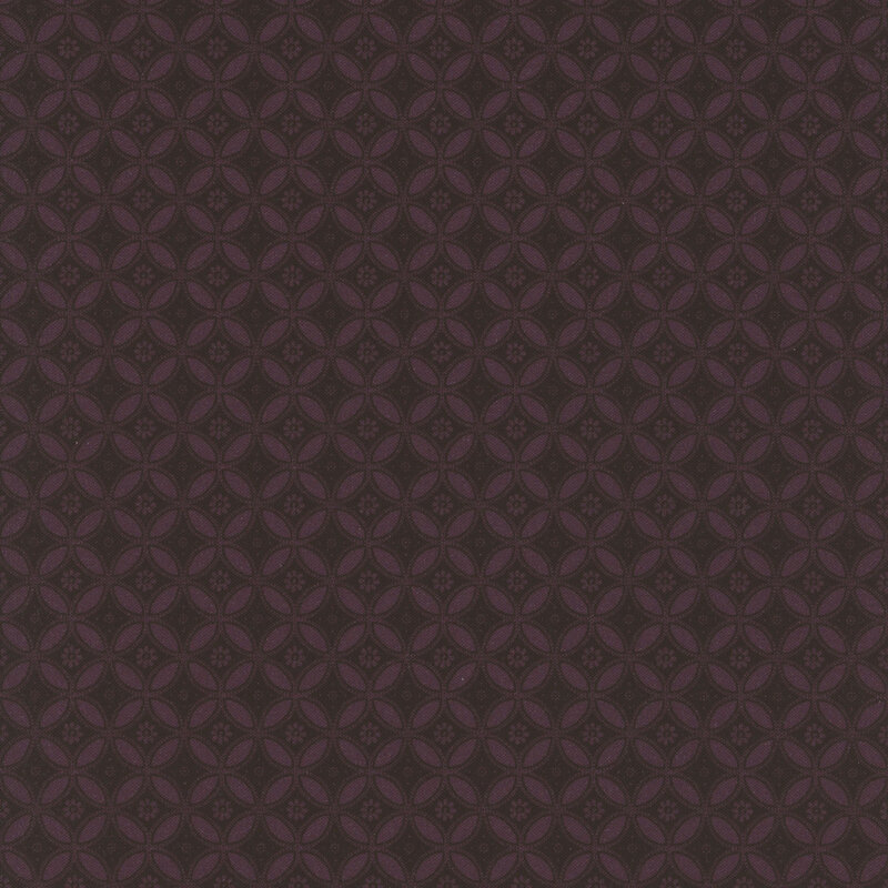 A fabric in deep purple featuring geometric floral shapes.