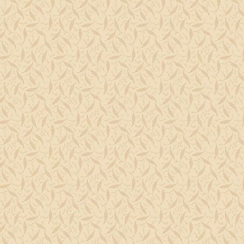 A tonal cream fabric with leaves and tiny sprigs. 
