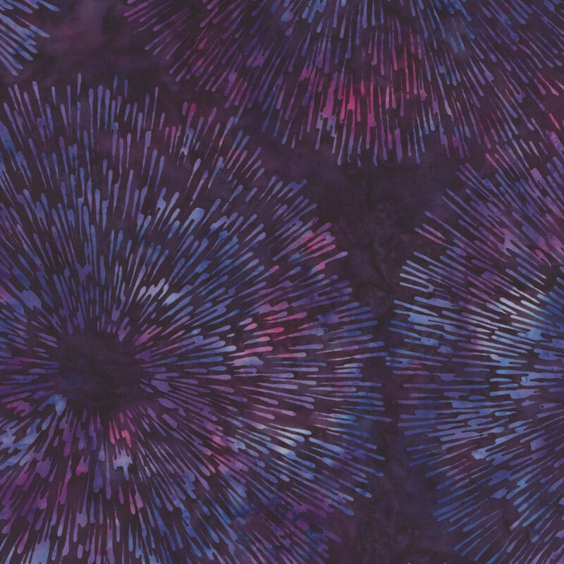 Abstract fabric pattern featuring blue, pink, and white bursts on a mottled purple background.
