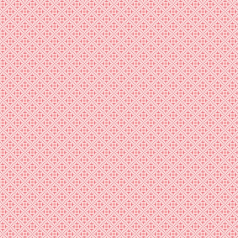 Pink fabric featuring a geometric design.