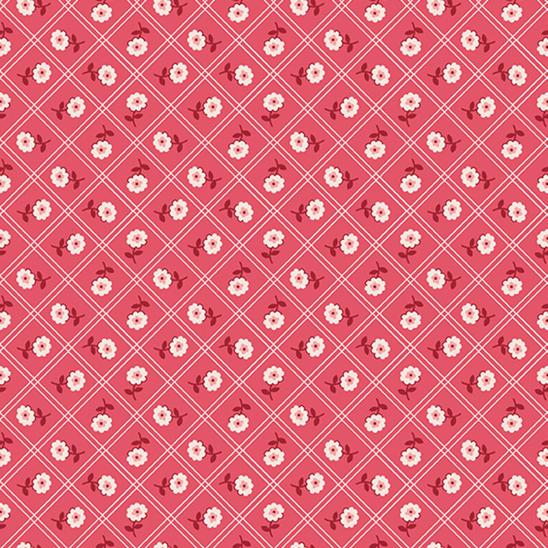 Watermelon red fabric with white flowers inside a white lattice pattern.