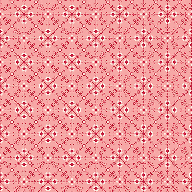 Coral pink fabric featuring a white and dark red geometric design.