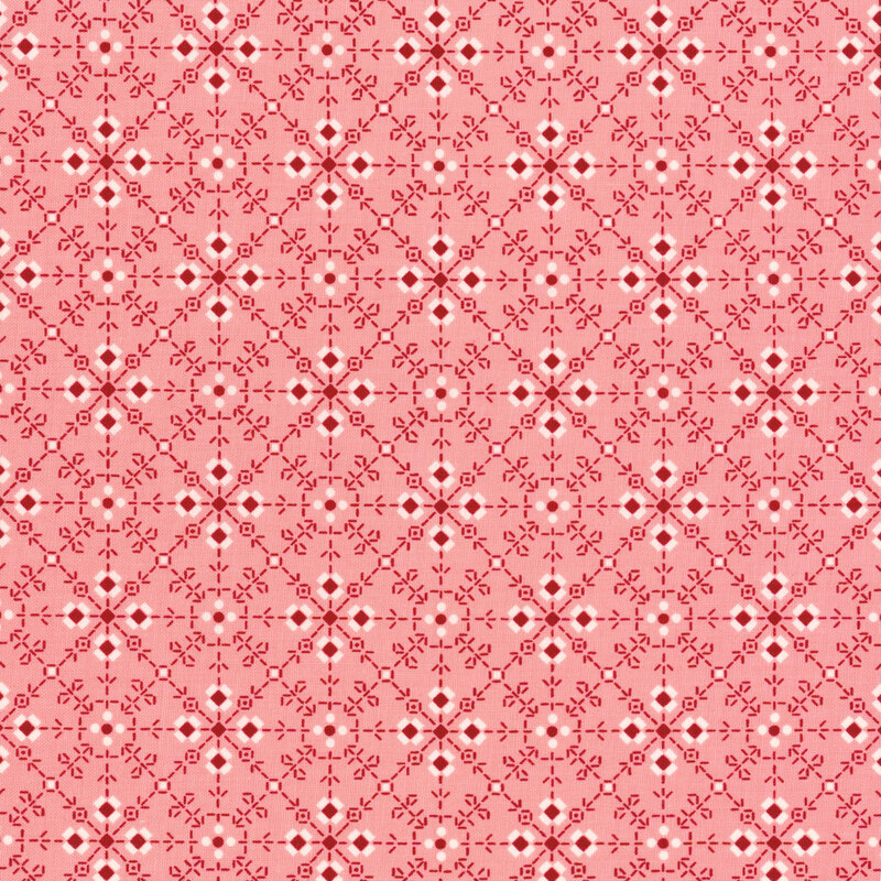 Coral pink fabric featuring a white and dark red geometric design.