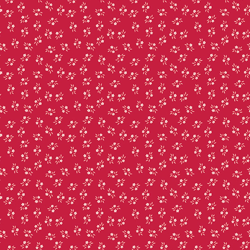 Bright red fabric featuring tossed white flowers.