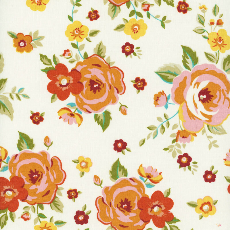 Peach, orange, and russet roses tossed on cream fabric.