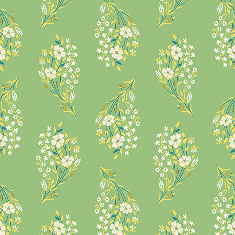 Posies of white flowers with yellow and teal leaves and stems tossed on mint green fabric.