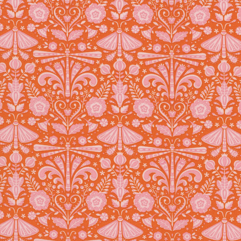 Cayenne orange fabric featuring salmon-pink symmetrical ornamental designs.