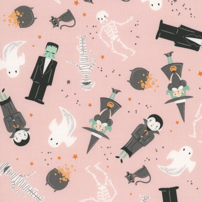 This light pink fabric features tossed whimsical Halloween characters, including ghosts, witches, skeletons, black cats, mummies, and Frankenstein.