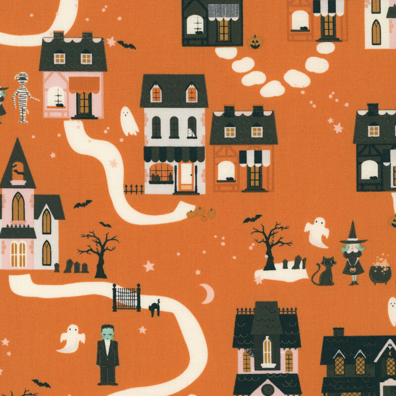 This orange fabric features a whimsical Halloween village with spooky houses, ghosts, bats, pumpkins, and classic monster characters.