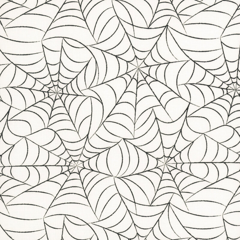 This white fabric features an intricate pattern of spiderwebs.