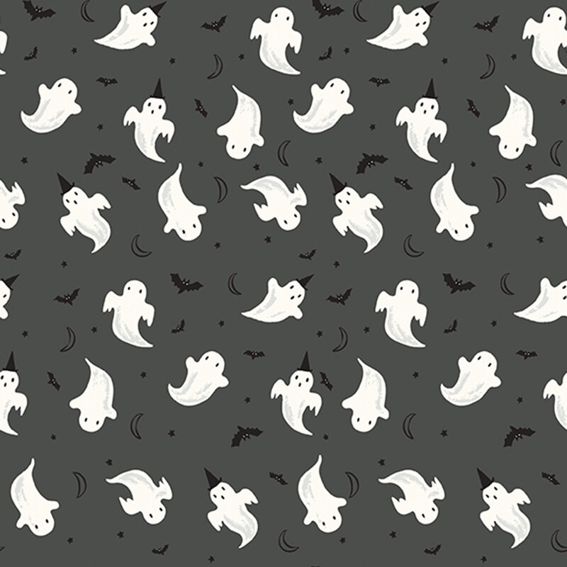This dark gray fabric features playful glow in the dark ghosts, fluttering bats, crescent moons, and tiny stars.