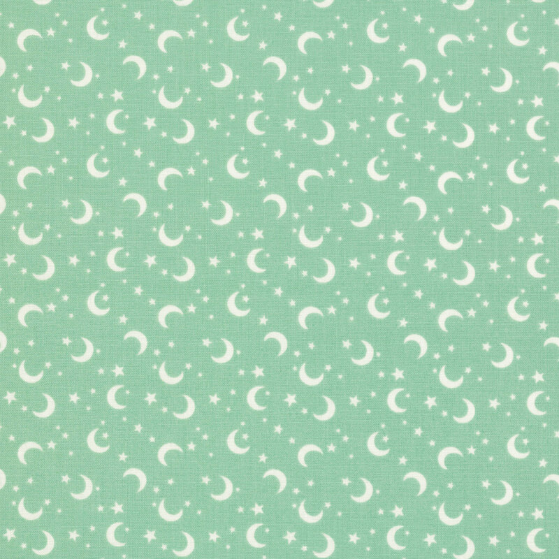 This teal fabric features scattered crescent moons and stars.