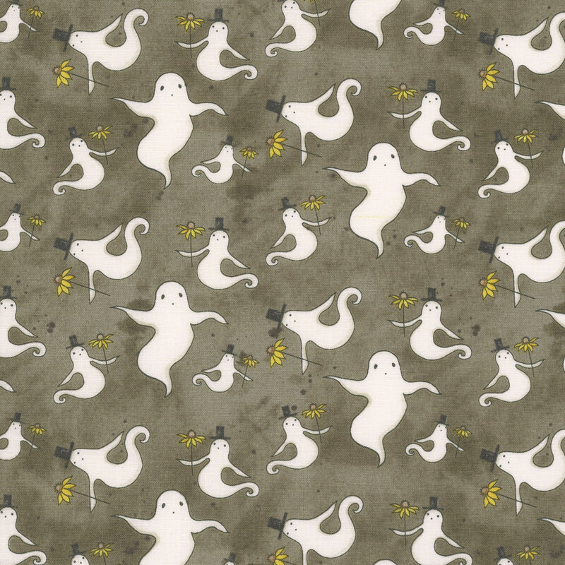 white ghosts in top hats holding yellow flowers tossed on mottled warm gray fabric