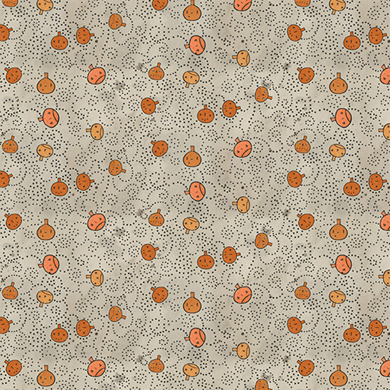 mottled light gray fabric featuring orange pumpkin faces tossed with black dotted swirls.