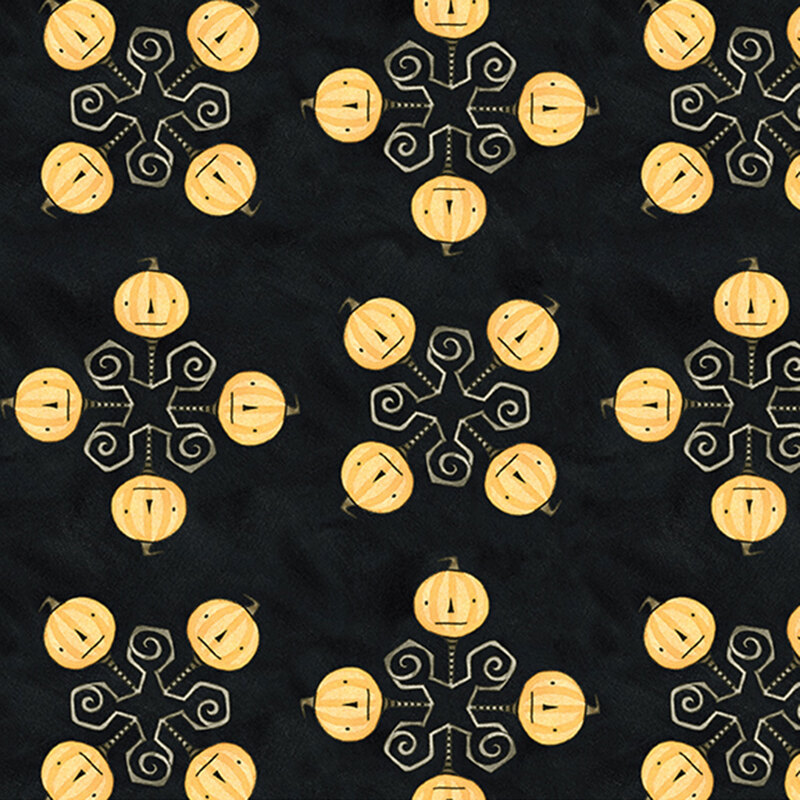 mottled black fabric featuring a geometric design topped with orange pumpkin heads.