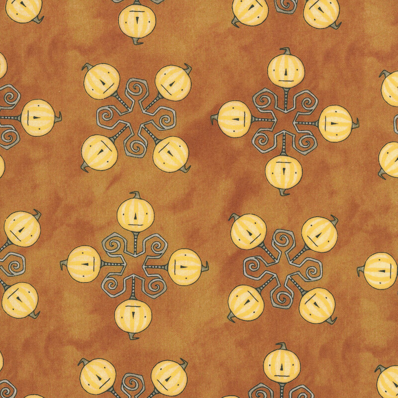 mottled orange fabric featuring a geometric design topped with orange pumpkin heads.