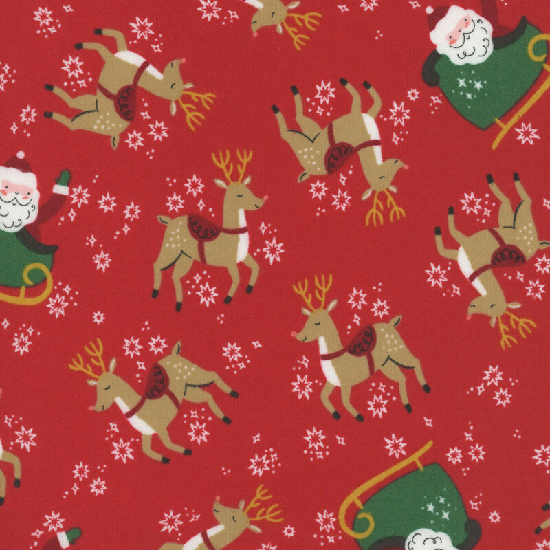 A tomato red fabric with tossed reindeer and santas in sleighs. 